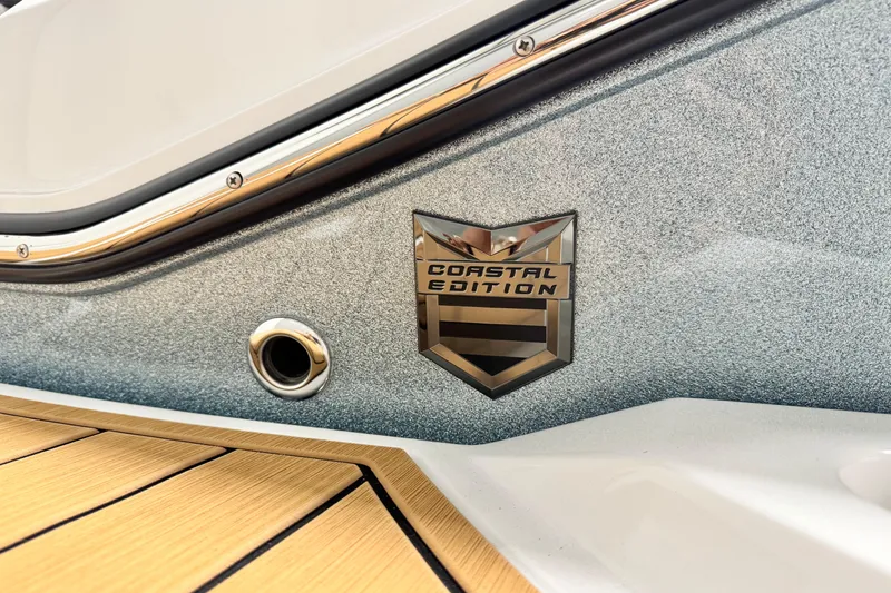 Slide: The Image of 2026 Nautique Super Air Nautique G23 Paragon Coastal Edition badge on boat exterior. - 7