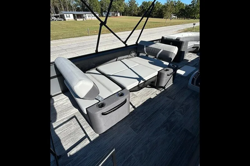 Slide: The Image of Luxurious seating on 2025 Viaggio Z22D boat with cup holders and modern design. - 13