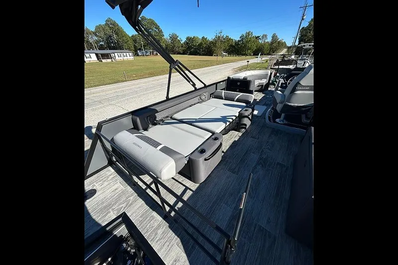 Slide: The Image of 2025 Viaggio Z22D pontoon boat interior with seating and cup holders. - 15