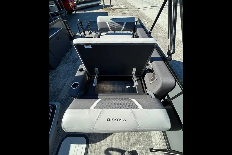 Slide: The Image of 2025 Viaggio Z22D boat interior with open storage compartment and seating. - 17