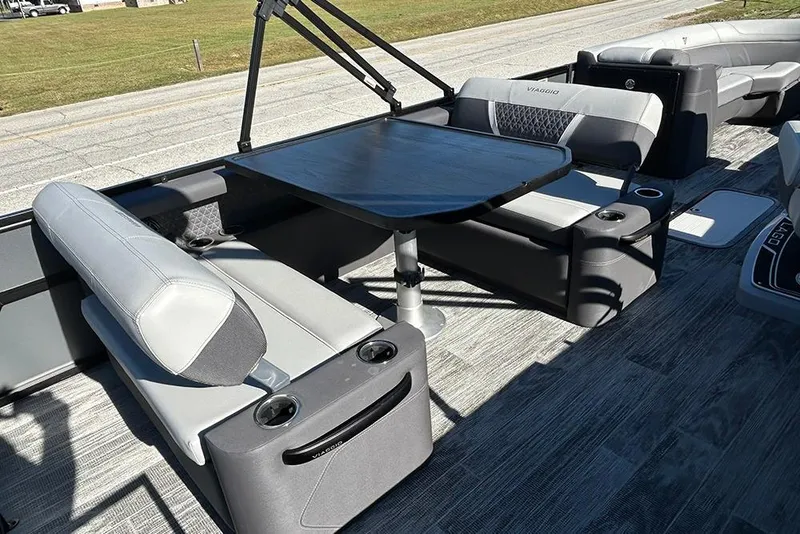 Slide: The Image of Interior of 2025 Viaggio Z22D boat with seating and table setup. - 21