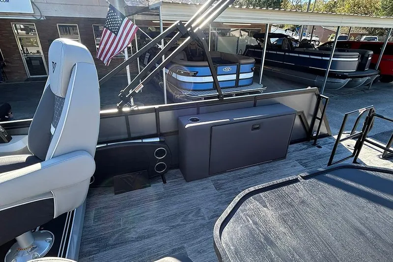 Slide: The Image of Interior of 2025 Viaggio Z22D pontoon boat with seating and American flag. - 35