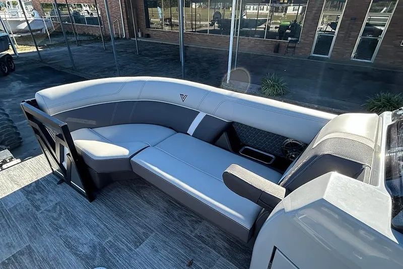 Slide: The Image of Luxurious seating on 2025 Viaggio Z22D boat, featuring sleek gray upholstery and modern design. - 37