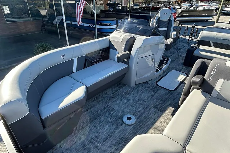 Slide: The Image of Luxurious 2025 Viaggio Z22D pontoon boat interior with plush seating and modern design. - 40