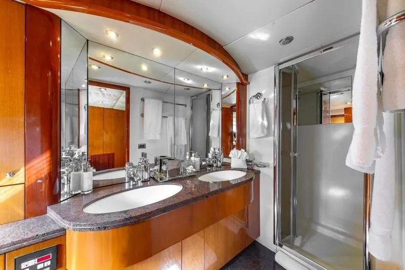 Slide: The Image of Luxurious bathroom on 2003 Sunseeker 82 Yacht with double sinks and modern shower. - 15