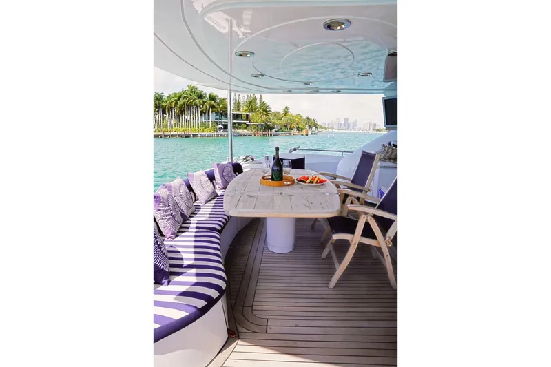 Slide: The Image of Luxurious Sunseeker 82 Yacht 2003 deck with elegant seating and ocean view. - 4