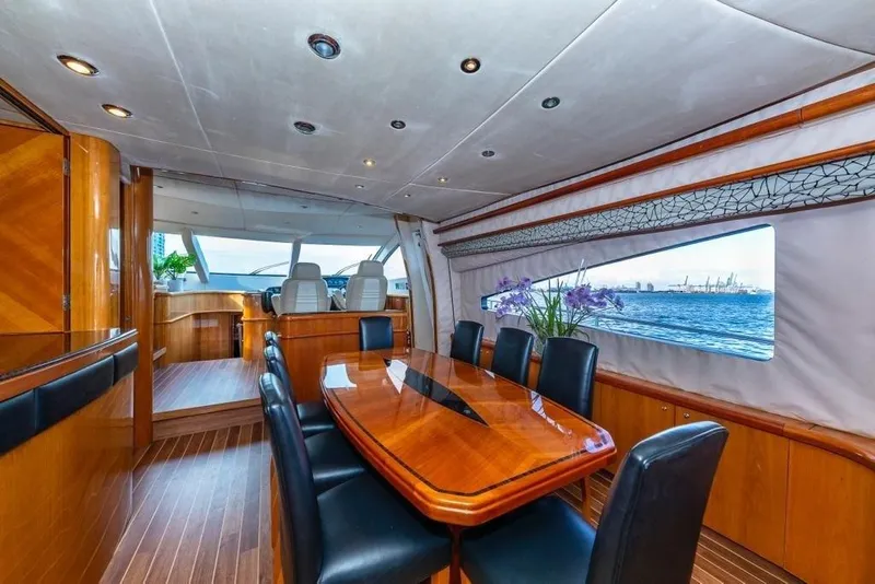 Slide: The Image of Luxurious interior of 2003 Sunseeker 82 Yacht with elegant dining area and sea view. - 9