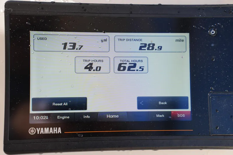 Slide: The Image of Yamaha display showing fuel usage and trip data on 2022 Grady-White Freedom 235 boat. - 32