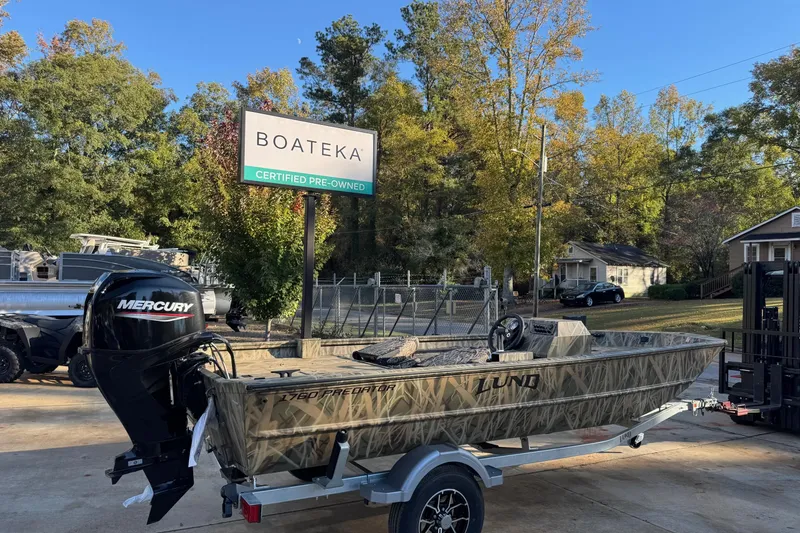 Slide: The Image of 2026 Lund 1760 Predator SC boat at Boateka, certified pre-owned, with Mercury engine. - 1