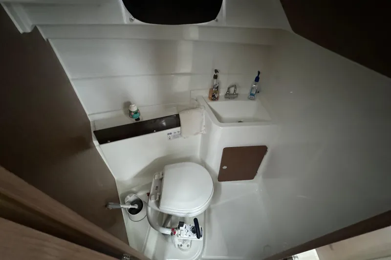 Slide: The Image of Beneteau Antares 8 2020 boat bathroom with toilet and sink. - 16