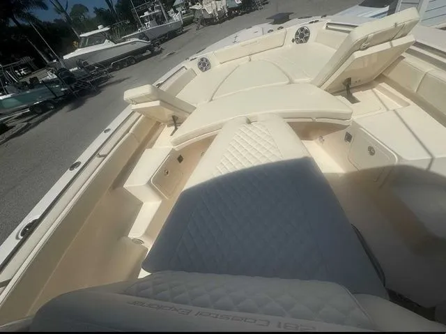 Slide: The Image of Open storage compartment on 2026 Grady-White 281 Coastal Explorer boat deck. - 16