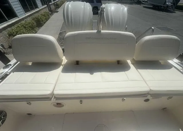 Slide: The Image of 2026 Grady-White 281 Coastal Explorer boat interior with seating and storage. - 17