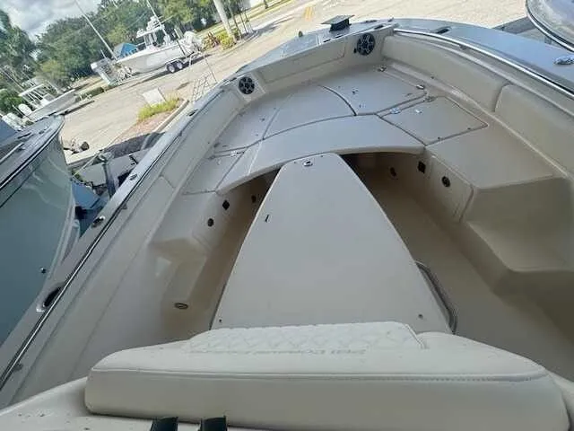 Slide: The Image of 2026 Grady-White 281 Coastal Explorer boat with spacious seating and modern design. - 18