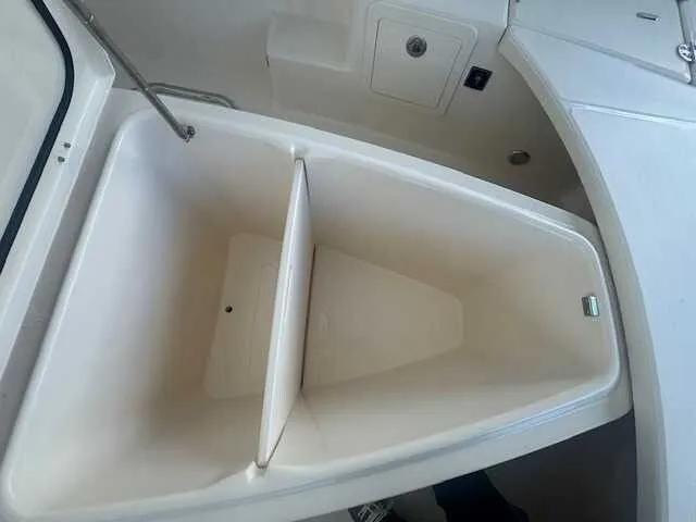 Slide: The Image of Storage compartment on 2026 Grady-White 281 Coastal Explorer boat, featuring sleek design. - 19