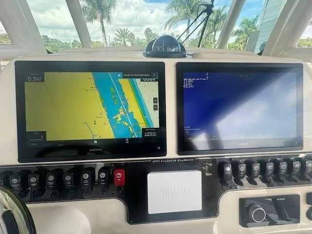 Slide: The Image of 2026 Grady-White 281 Coastal Explorer boat interior ceiling with speakers and lighting. - 28