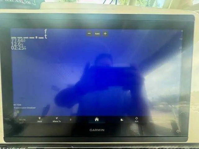 Slide: The Image of 2026 Grady-White 281 Coastal Explorer boat interior with seating and storage features. - 45