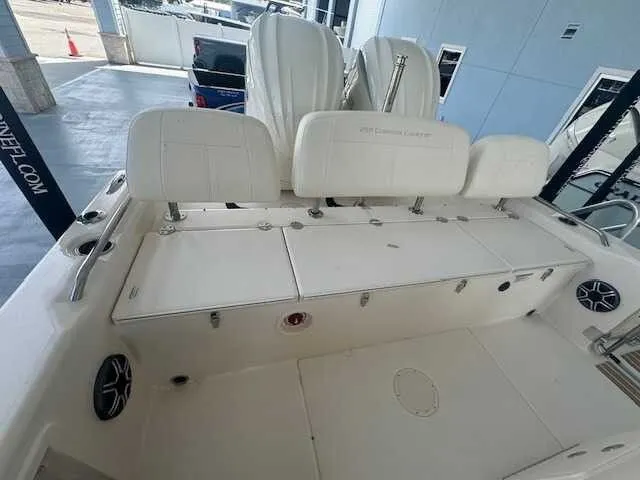 Slide: The Image of 2026 Grady-White 281 Coastal Explorer boat interior with open storage compartments. - 46