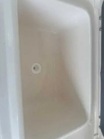 Slide: The Image of 2026 Grady-White 281 Coastal Explorer boat on trailer at dealership. - 7