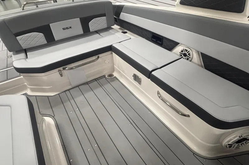 Slide: The Image of 2026 Chaparral SSX 30 boat interior with gray seating and modern design. - 15