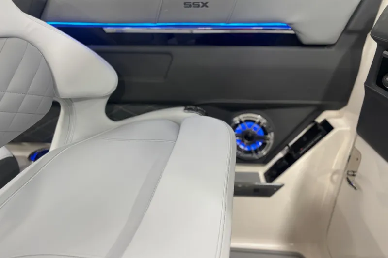 Slide: The Image of Interior of 2026 Chaparral SSX 30 boat with modern seating and blue LED lighting. - 23
