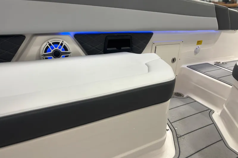 Slide: The Image of 2026 Chaparral SSX 30 boat interior with speaker and seating, featuring modern design elements. - 25