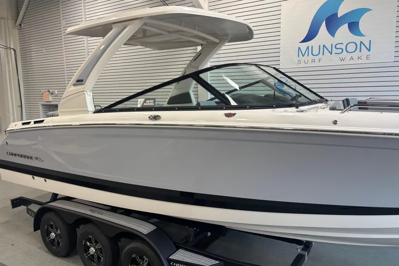 Slide: The Image of 2026 Chaparral SSX 30 boat displayed at Munson Surf Wake showroom. - 3