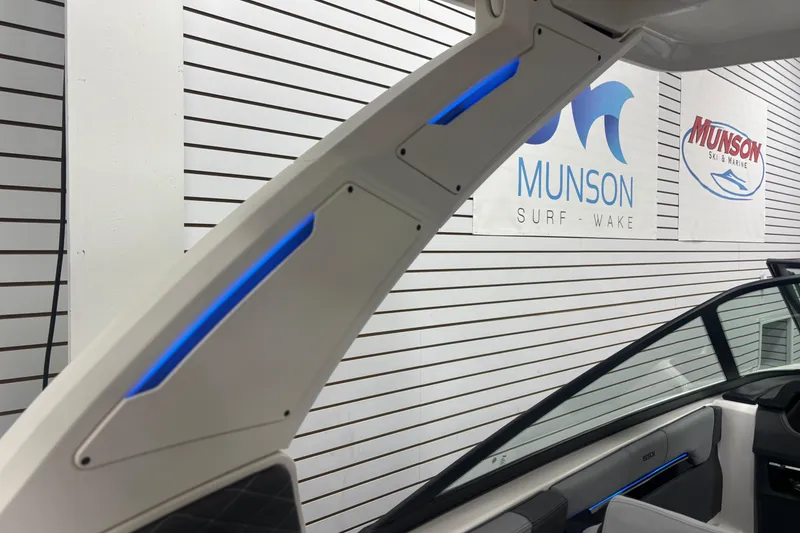 Slide: The Image of 2026 Chaparral SSX 30 boat interior with blue LED lighting at Munson Ski & Marine. - 33