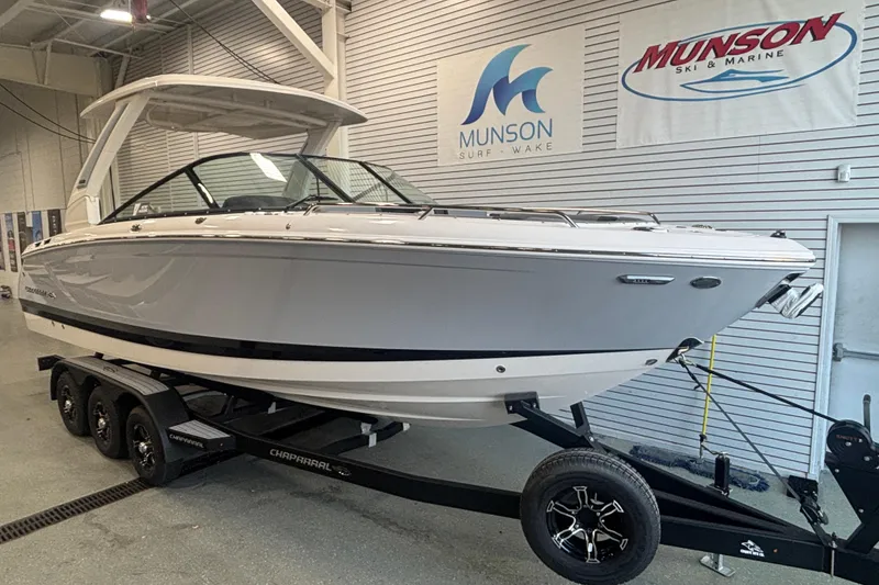 Slide: The Image of 2026 Chaparral SSX 30 boat on trailer in showroom, Munson Ski & Marine. - 4