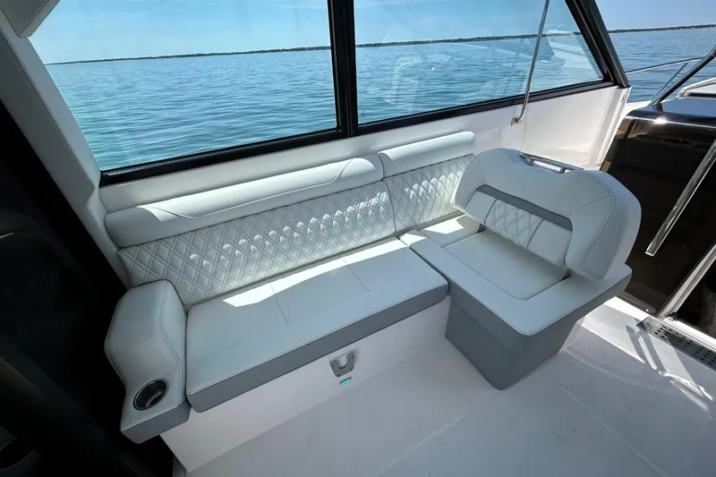 Slide: The Image of Luxurious seating area on 2025 Regal 36 XO yacht with ocean view. - 20