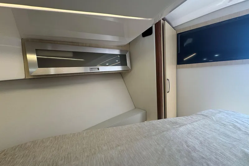 Slide: The Image of Interior cabin of 2025 Regal 36 XO yacht, featuring modern design and sleek finishes. - 53