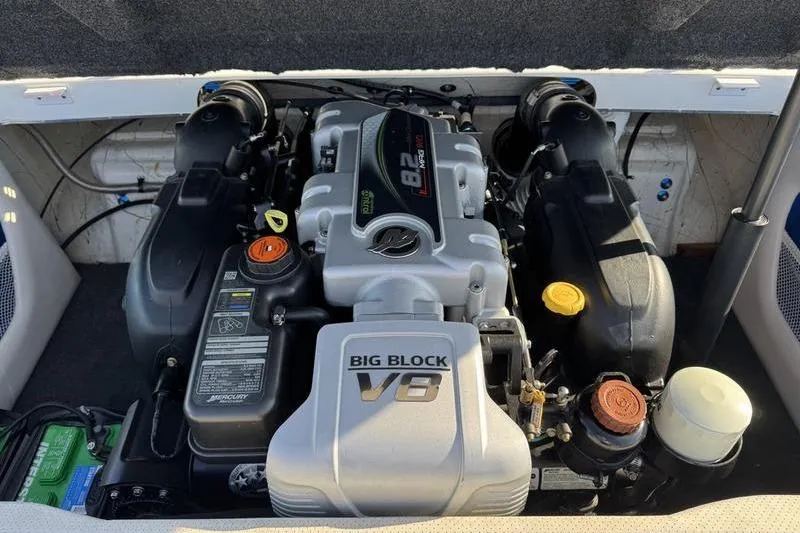 Slide: The Image of 2013 Caliber 1 230 Velocity engine, featuring a powerful Big Block V8. - 3