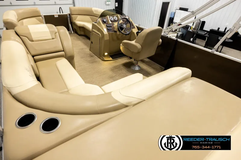 Slide: The Image of Luxurious interior of 2022 SunChaser 20 Geneva CRS pontoon boat with plush seating. - 11