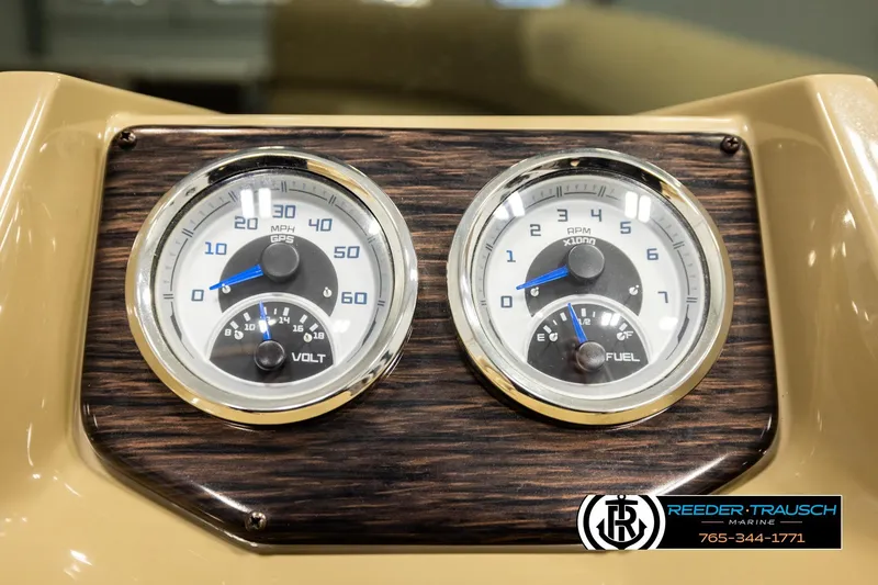 Slide: The Image of Dashboard gauges of 2022 SunChaser 20 Geneva CRS boat, featuring speedometer and fuel indicators. - 31