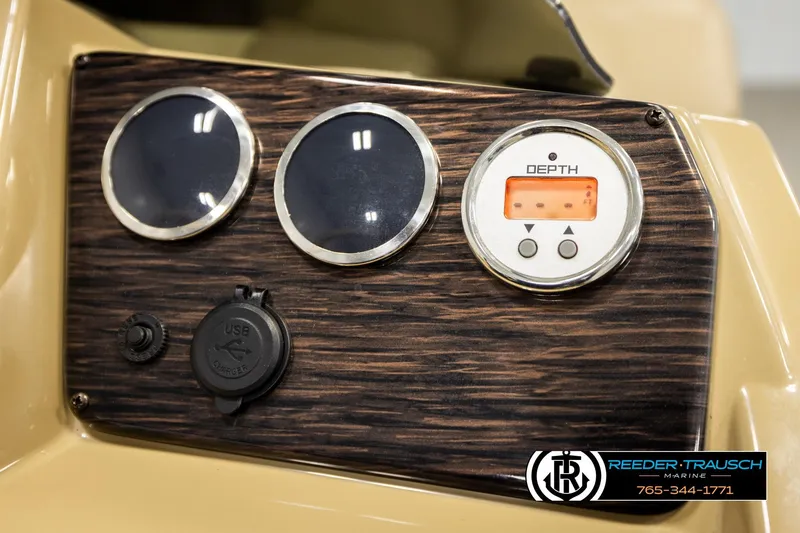 Slide: The Image of Dashboard of 2022 SunChaser 20 Geneva CRS with depth gauge and USB charger. - 32