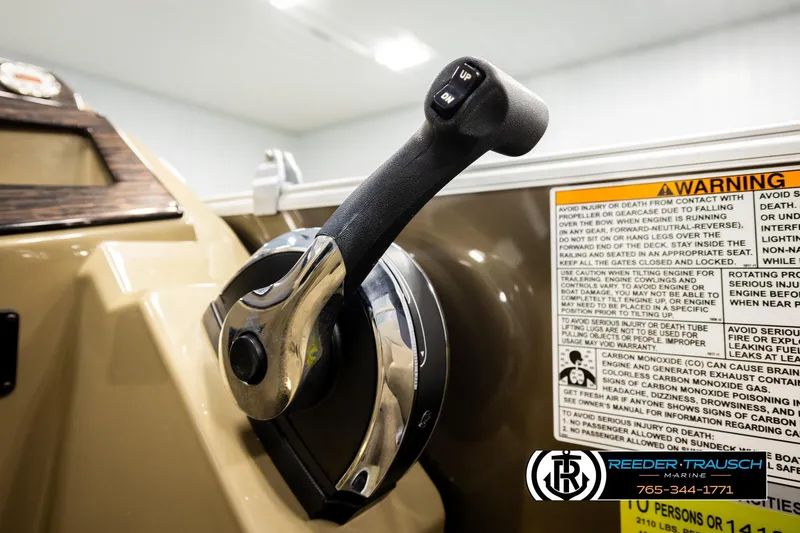 Slide: The Image of Close-up of 2022 SunChaser 20 Geneva CRS throttle control with warning label. - 34