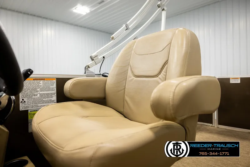 Slide: The Image of Beige captain's chair on 2022 SunChaser 20 Geneva CRS boat, indoor setting. - 35