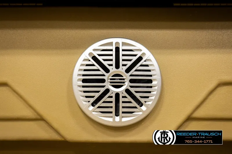 Slide: The Image of White speaker on 2022 SunChaser 20 Geneva CRS boat, Reeder-Trausch Marine logo visible. - 38