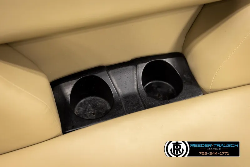 Slide: The Image of Cup holders in beige seating of 2022 SunChaser 20 Geneva CRS boat. - 39