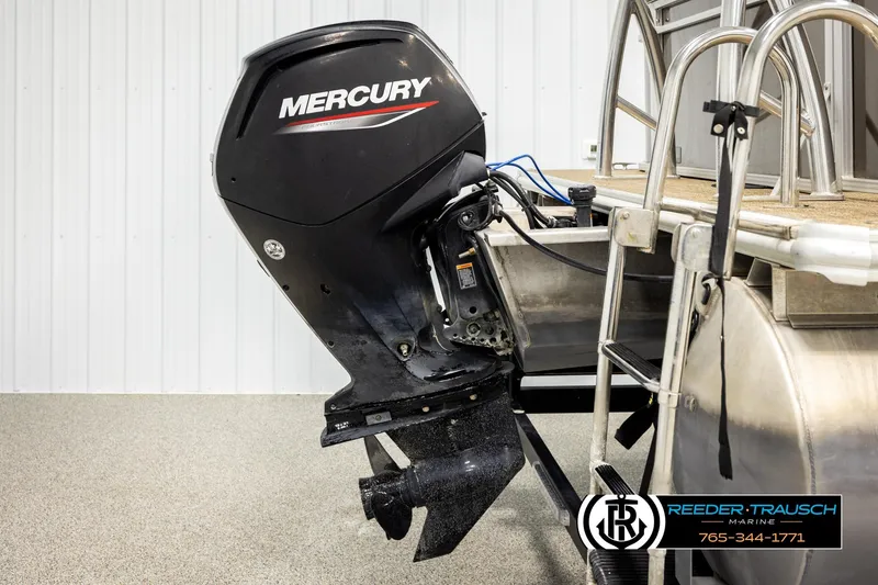 Slide: The Image of 2022 SunChaser 20 Geneva CRS with Mercury outboard motor in showroom. - 41