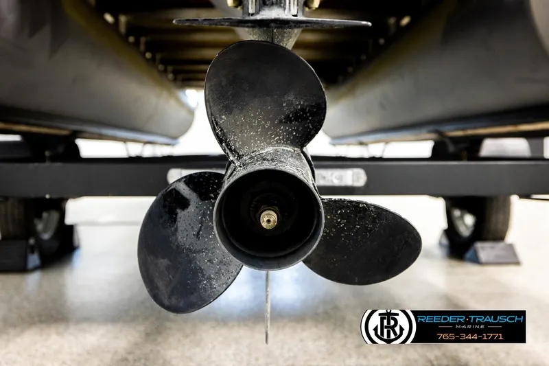 Slide: The Image of Close-up of a 2022 SunChaser 20 Geneva CRS boat propeller in a showroom. - 44