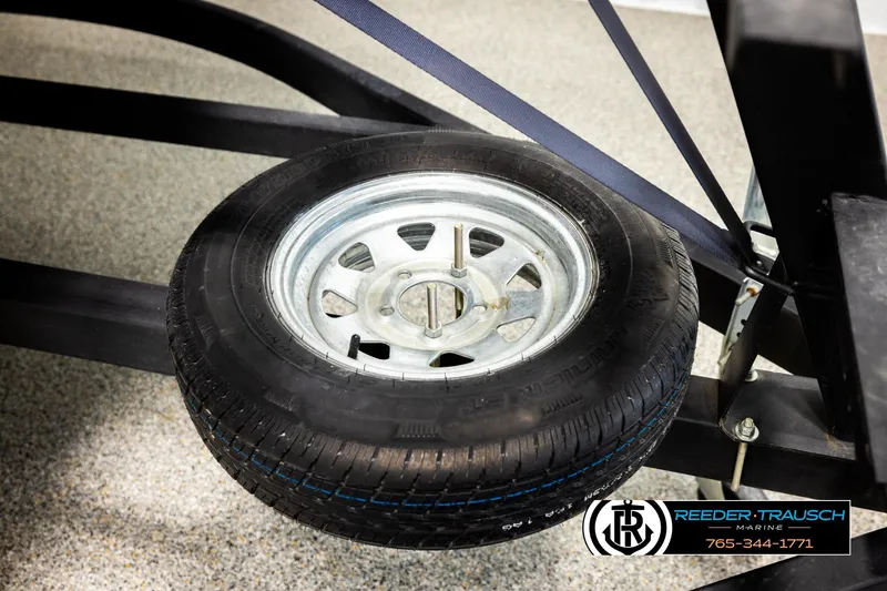 Slide: The Image of Spare tire mounted on a trailer for a 2022 SunChaser 20 Geneva CRS boat. - 45