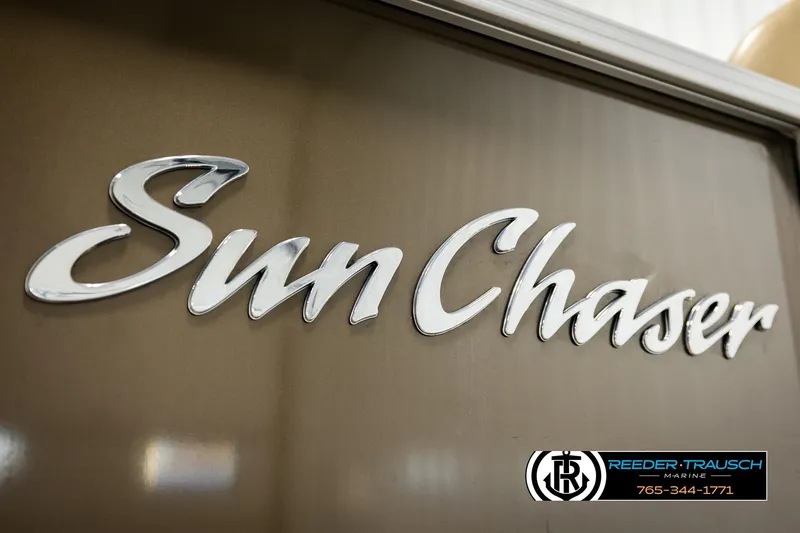 Slide: The Image of SunChaser 20 Geneva CRS 2022 logo on a sleek brown surface. - 47