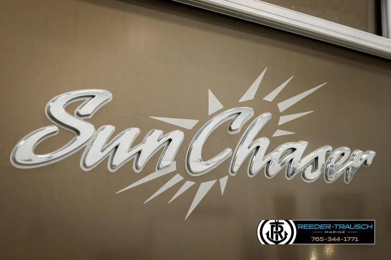 Slide: The Image of SunChaser 20 Geneva CRS 2022 logo on a metallic surface, Reeder-Trausch Marine branding. - 48