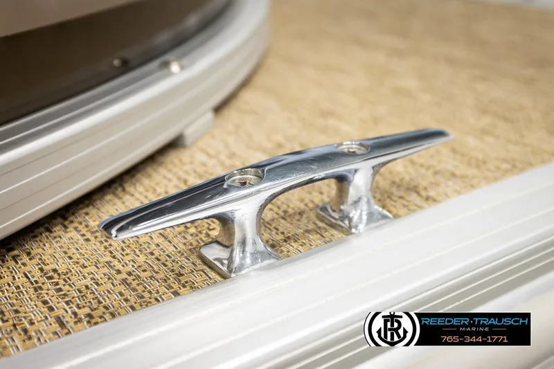 Slide: The Image of Close-up of a 2022 SunChaser 20 Geneva CRS boat cleat on textured deck. - 50