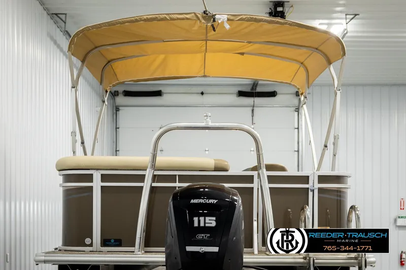 Slide: The Image of 2022 SunChaser 20 Geneva CRS pontoon boat with Mercury 115 engine in a showroom. - 7