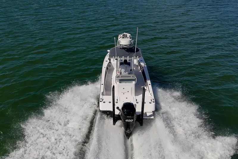 Slide: The Image of Bonefish, Bonefish Skiff, Carolina Skiff, Contender, Yellowfin, SeaVee, Regulator, Bay Boat, Power Pole, Mercury, REV Yacht Sales - 8