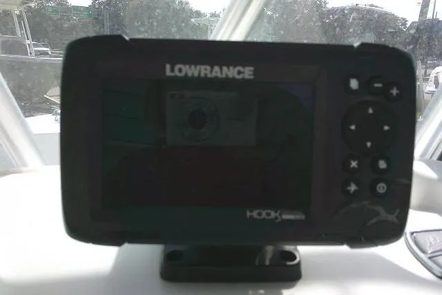 Slide: The Image of Lowrance Hook fish finder on 2014 Tidewater 196 CC Adventure boat dashboard. - 16