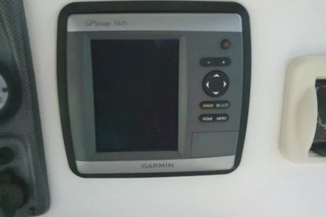 Slide: The Image of Garmin GPS device on 2014 Tidewater 196 CC Adventure boat dashboard. - 17