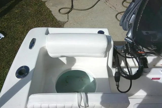 Slide: The Image of 2014 Tidewater 196 CC Adventure boat with livewell and seating area. - 22