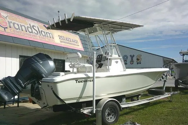Slide: The Image of 2014 Tidewater 196 CC Adventure boat on trailer, parked outside dealership. - 4